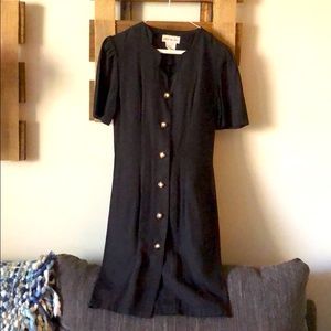 Chic black dress with pearl buttons